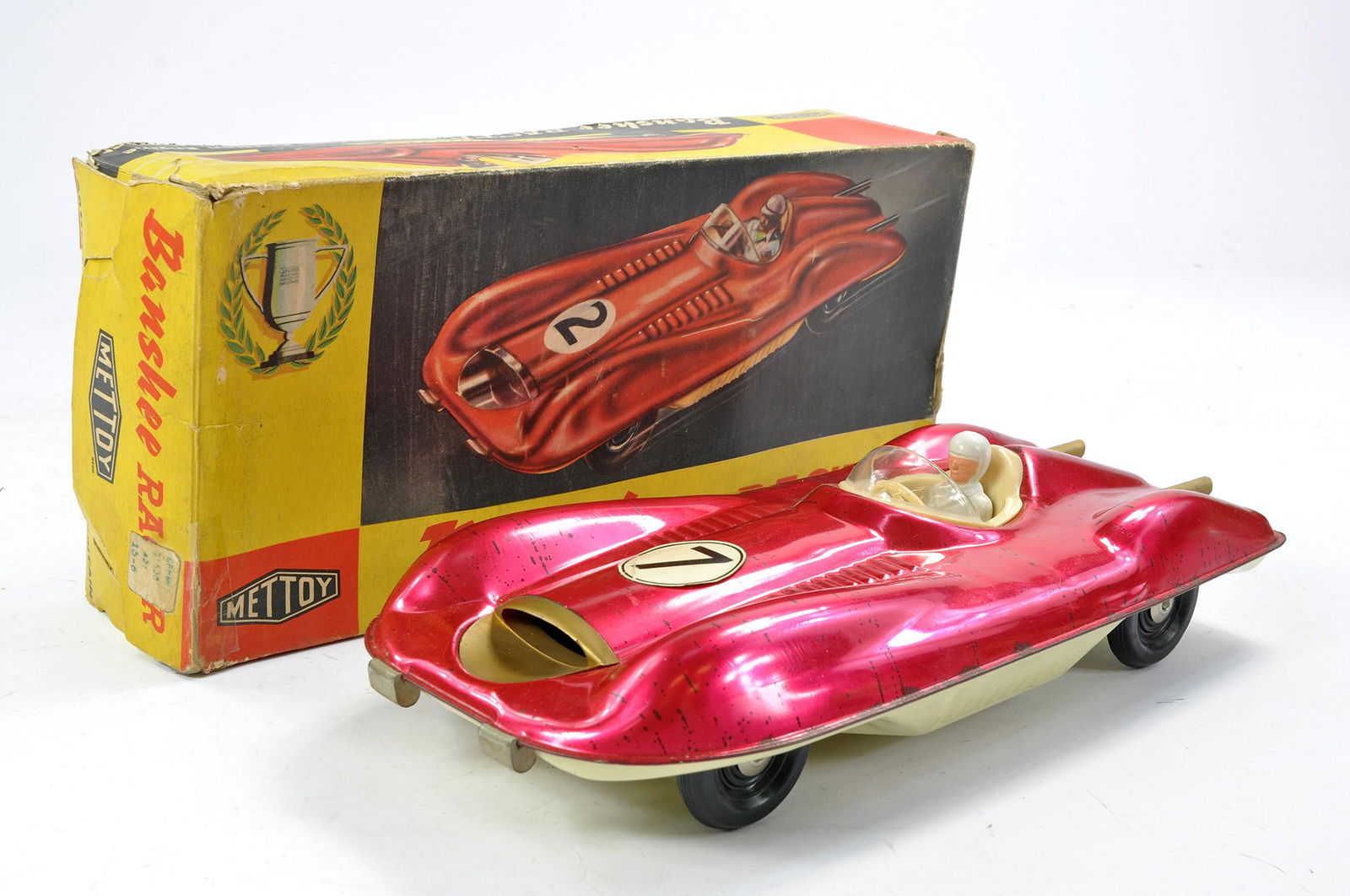 Mettoy no.3091 large tinplate friction driven 'Banshee' Racer in bright pink / magenta. With driver (1 of 1)