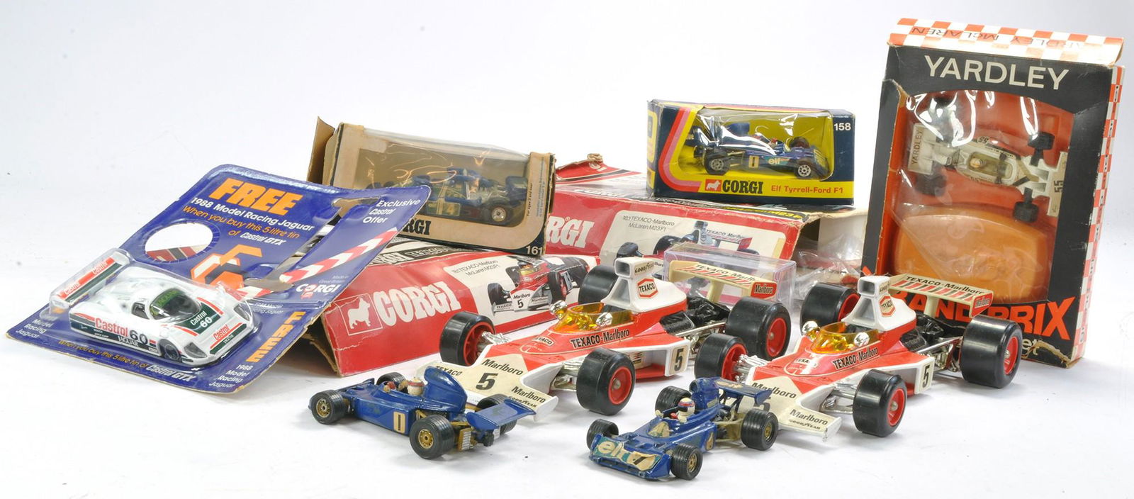 Corgi group of Racing Cars comprising Promotional Yardley McLaren Soap set inclusive of toy and soap: Corgi group of Racing Cars comprising Promotional Yardley McLaren Soap set inclusive of toy and soap in fair box, plus other racing issues as shown. Mostly good to very good in fair boxes with signifi