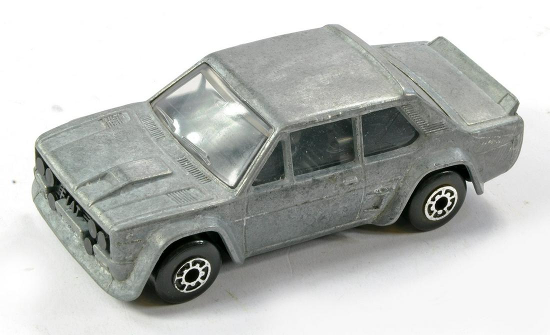 Matchbox Superfast No. 74e Fiat Abarth. Made in Bulgaria. Unpainted (Factory) with black interior: Matchbox Superfast No. 74e Fiat Abarth. Made in Bulgaria. Unpainted (Factory) with black interior and base.