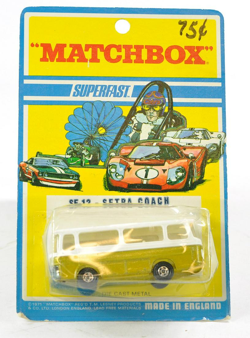 Matchbox Superfast No. 12b Setra Coach. Metallic gold body, white interior. Excellent on very good: Matchbox Superfast No. 12b Setra Coach. Metallic gold body, white interior. Excellent on very good card, blister creased and split.