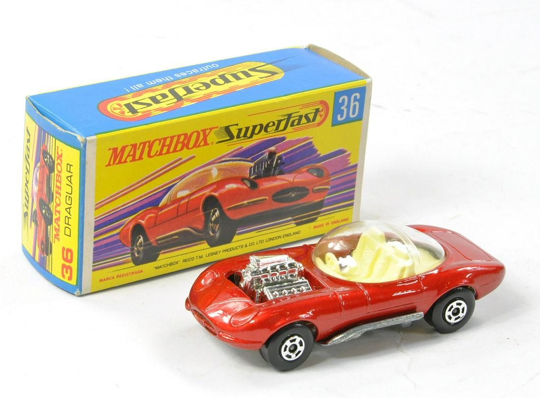 Matchbox Superfast No. 36b Draguar. Metallic Red, unpainted base. Excellent in excellent G Type box: Matchbox Superfast No. 36b Draguar. Metallic Red, unpainted base. Excellent in excellent G Type box without new.