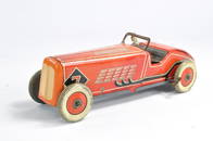 Mettoy 1930's mechanical tinplate racing car with driver. In good working order. Generally very good