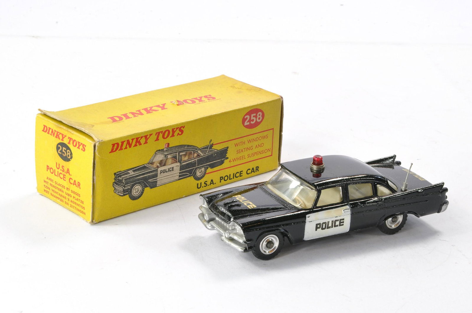 Dinky No. 258 USA Police Car. Black with white interior. Very good, some minor rubs and marks in: Dinky No. 258 USA Police Car. Black with white interior. Very good, some minor rubs and marks in good, slightly grubby box.