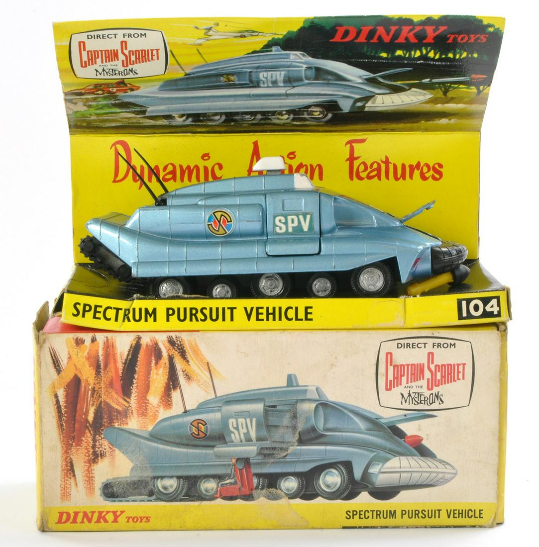 Dinky No. 104 Captain Scarlet Spectrum Pursuit Vehicle. This version is blue with black front: Dinky No. 104 Captain Scarlet Spectrum Pursuit Vehicle. This version is blue with black front bumper, cast unspun hubs, black aerials & rubber tracks. Comes with missile. Generally very good, some min
