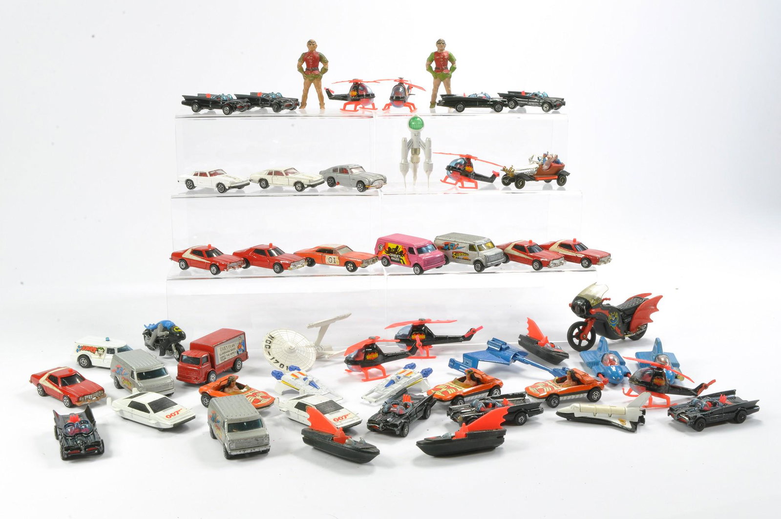 An impressive group of mostly Corgi Juniors Batman and other TV Related issues, with play wear as: An impressive group of mostly Corgi Juniors Batman and other TV Related issues, with play wear as shown (48 items).