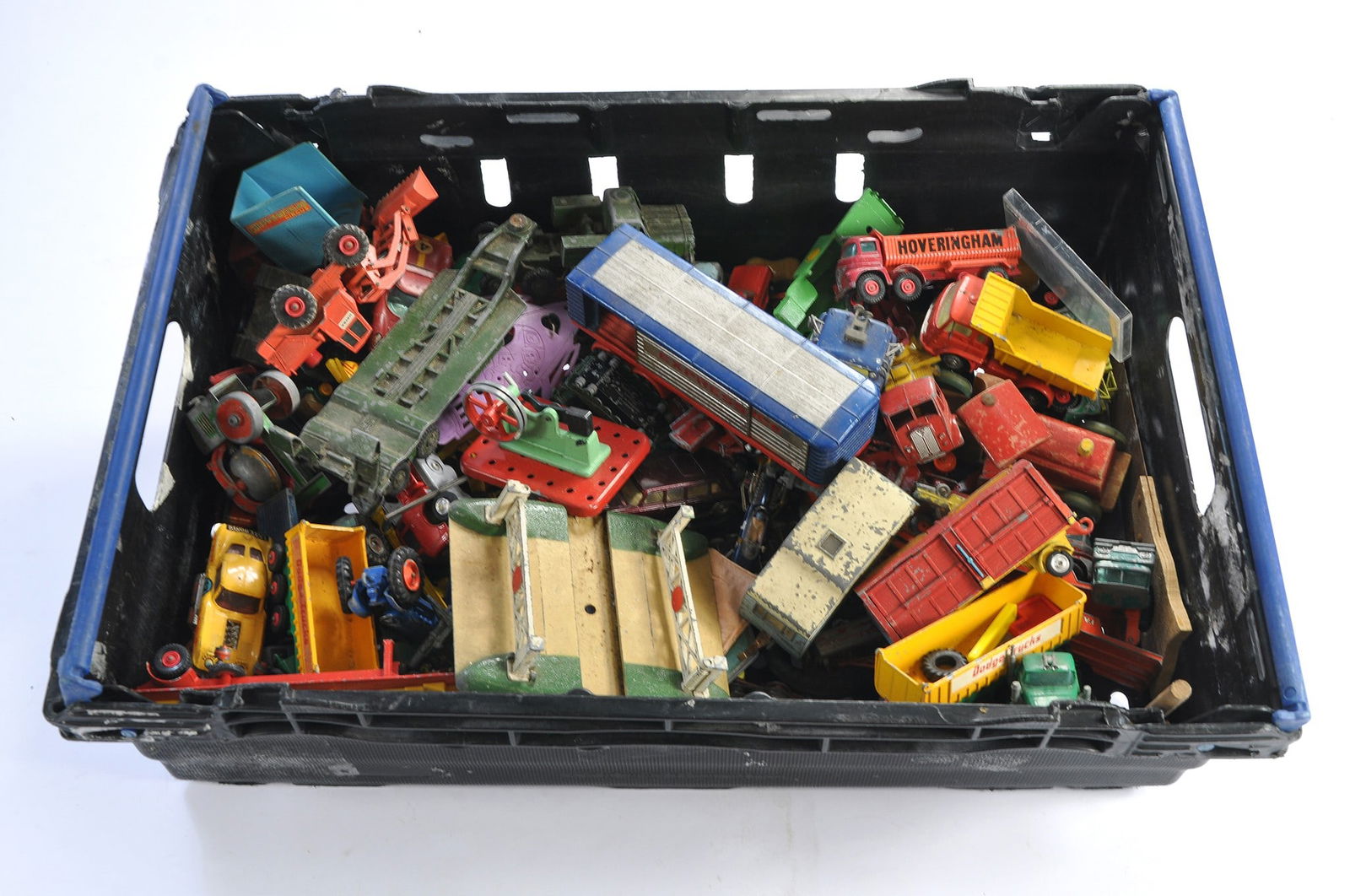 A large tray comprising a playworn childhood collection of vintage diecast vehicles including Corgi, (1 of 3)