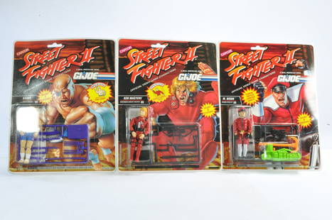 Hasbro 1993 Capcom Street Fighter II (GI JOE) carded figure trio comprising Sagat, Ken Masters and: Hasbro 1993 Capcom Street Fighter II (GI JOE) carded figure trio comprising Sagat, Ken Masters and M. Bison. Factory sealed.