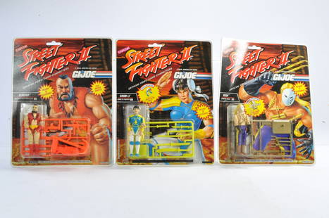 Hasbro 1993 Capcom Street Fighter II (GI JOE) carded figure trio comprising Zangief, Chun li and: Hasbro 1993 Capcom Street Fighter II (GI JOE) carded figure trio comprising Zangief, Chun li and Vega. Factory sealed.