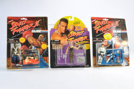 Hasbro 1993 Capcom Street Fighter II (GI JOE) carded figure duo plus Original Street Fighter Movie: Hasbro 1993 Capcom Street Fighter II (GI JOE) carded figure duo plus Original Street Fighter Movie single issue comprising Balrog, Ryu and Guile. Factory sealed.