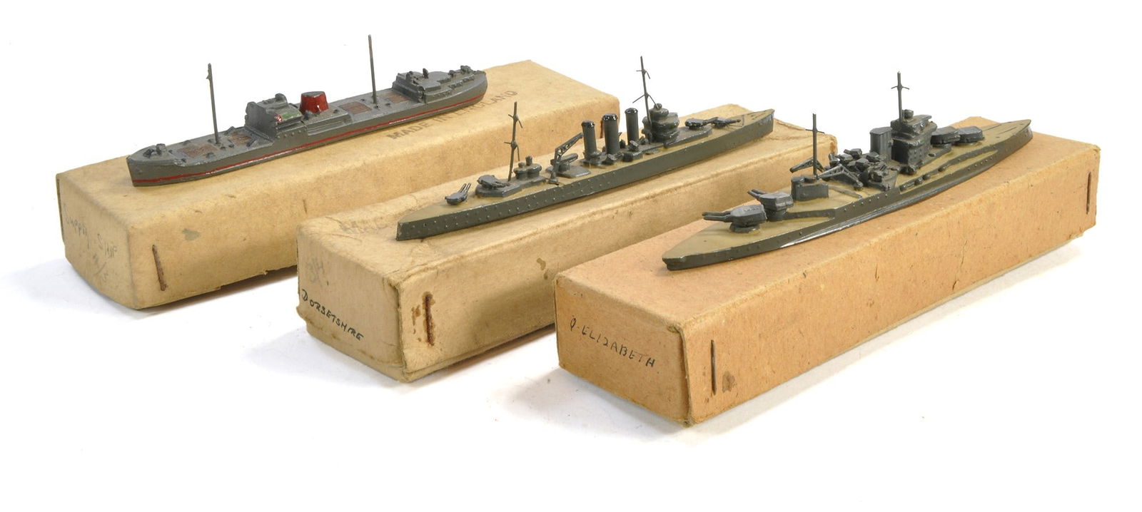 TM / Tremo Treforest Mouldings trio of Lead Waterline ships comprising Supply ship, Dorsetshire and: TM / Tremo Treforest Mouldings trio of Lead Waterline ships comprising Supply ship, Dorsetshire and Queen Elizabeth. Mostly look to be very good to excellent in original boxes. Hard to find in this co