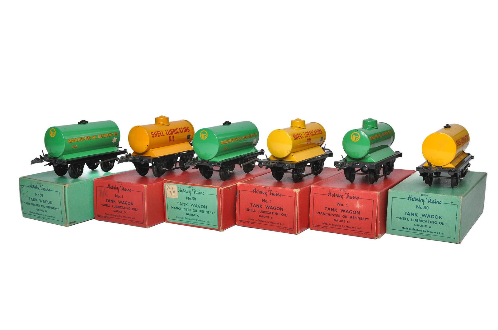 A group of 6 Hornby Model Railway O Gauge 'Manchester Oil Refinery' and 'Shell Lubricating Oil' Tank: A group of 6 Hornby Model Railway O Gauge 'Manchester Oil Refinery' and 'Shell Lubricating Oil' Tank Wagons - 3xNo.1 and 3xNo.5O. Generally in good to very good condition with boxes.