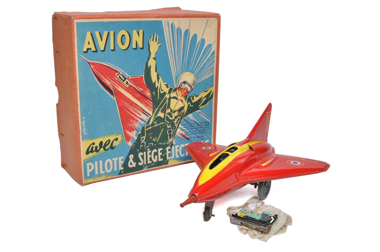 Joustra (France) Mechanical tinplate Aircraft with Ejectable Pilot. Looks to be complete and: Joustra (France) Mechanical tinplate Aircraft with Ejectable Pilot. Looks to be complete and generally very good in very good original box.