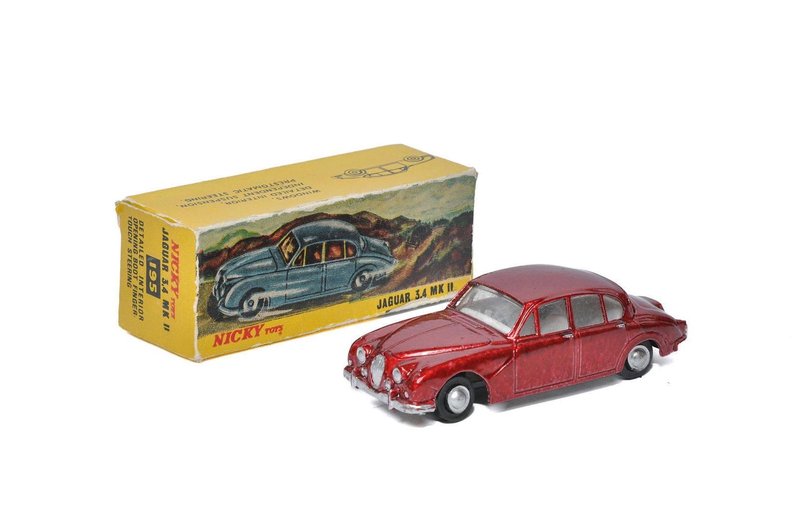 Dinky / Nicky Toys No. 195 Jaguar 3.4 MKII. Metallic Red. Generally very good to excellent with only (1 of 1)