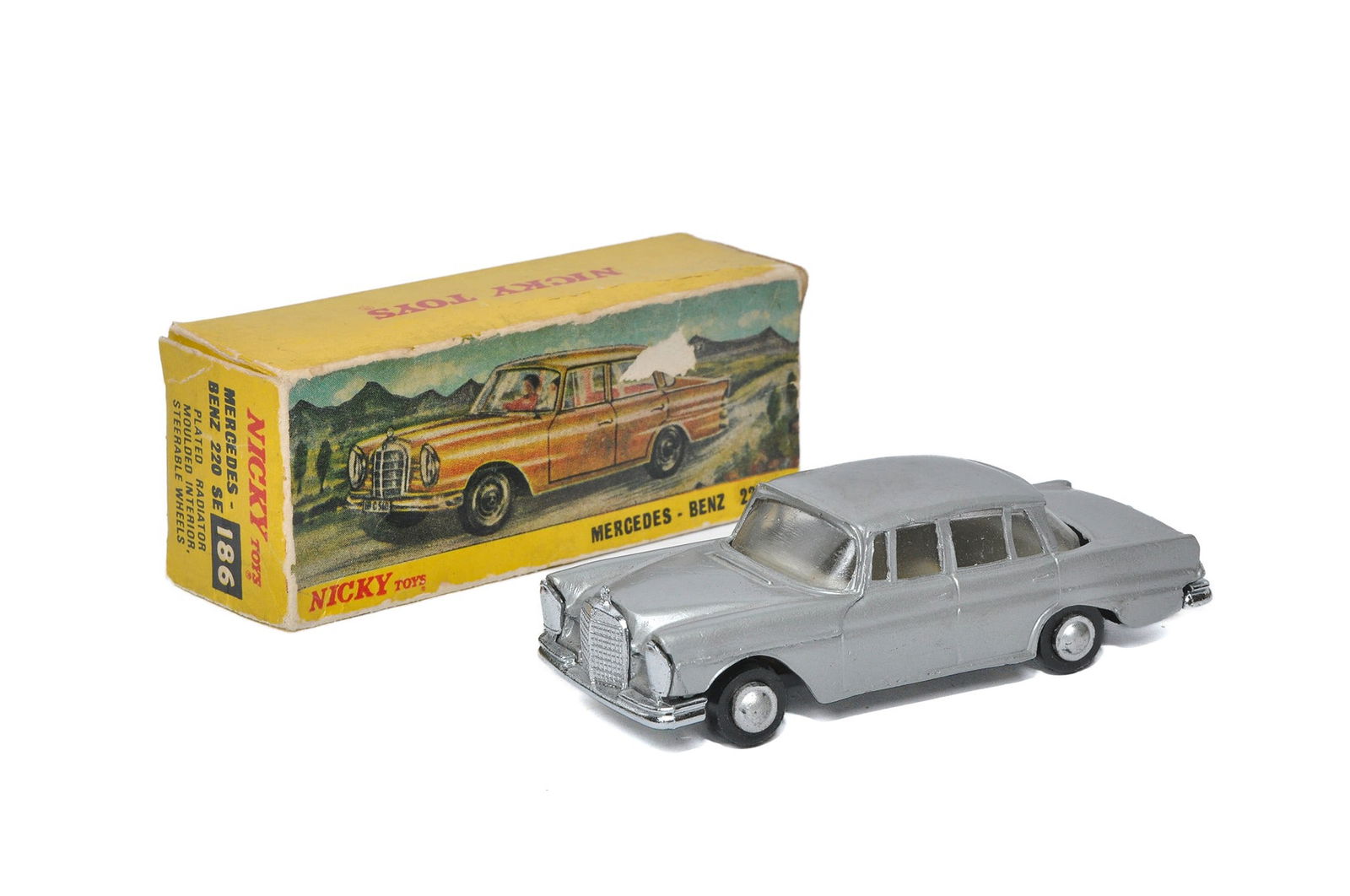 Dinky / Nicky Toys No. 186 Mercedes Benz 220SE. Silver. Generally very good with only minor signs of: Dinky / Nicky Toys No. 186 Mercedes Benz 220SE. Silver. Generally very good with only minor signs of age related wear in fair to good original box.
