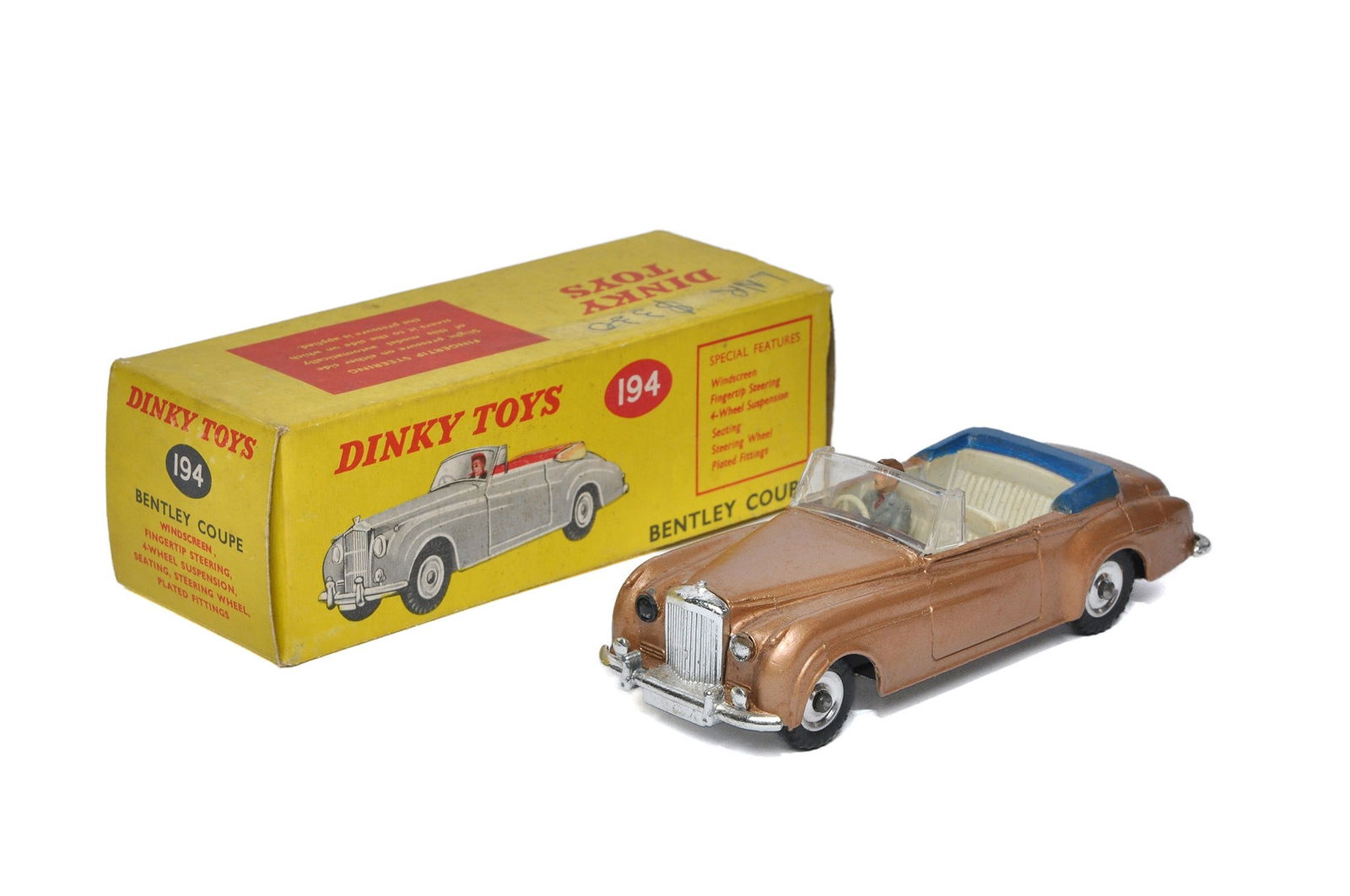 Dinky No. 194 Bentley Coupe. Bronze with cream interior. Generally good to very good. A few signs of (1 of 1)