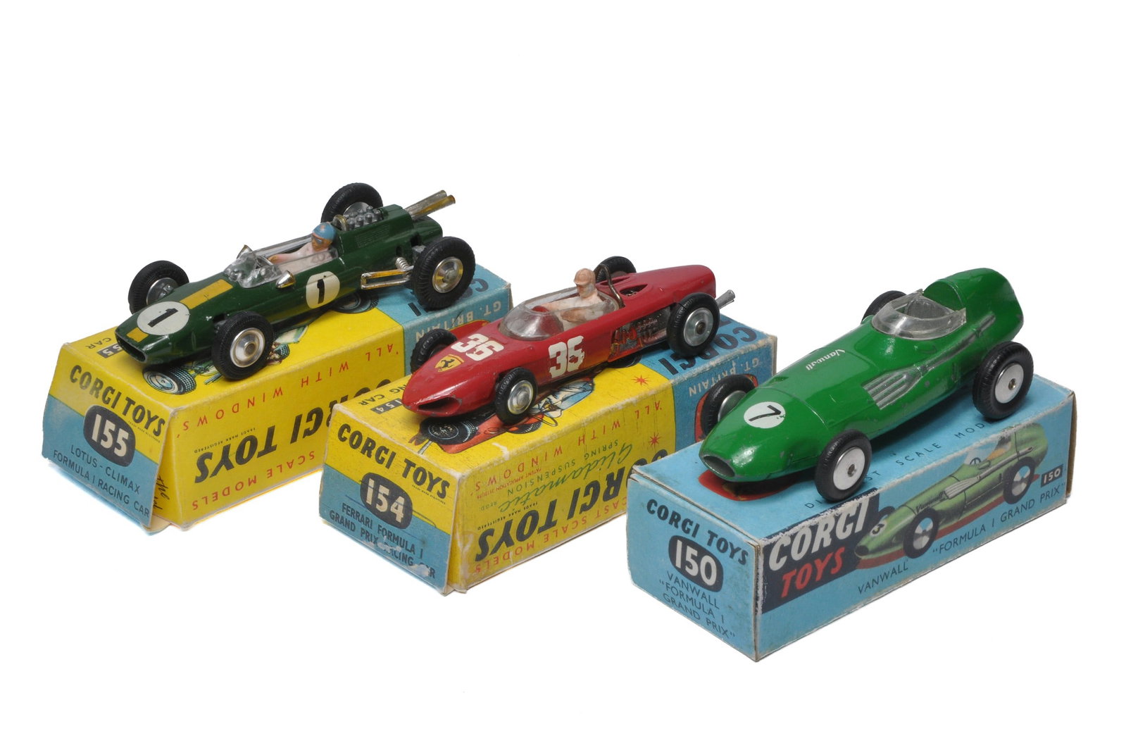 Corgi trio of racing cars including Lotus, Ferrari and Vanwall. Generally good to very good in: Corgi trio of racing cars including Lotus, Ferrari and Vanwall. Generally good to very good in reproduction boxes.