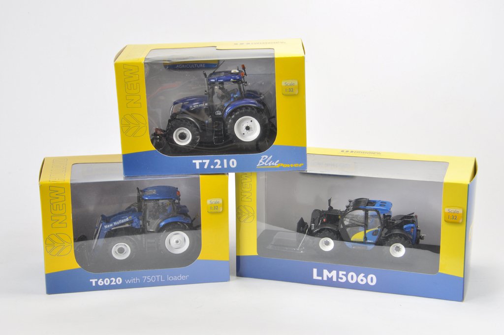 Universal Hobbies Tractor Dealer Issues including New: Universal Hobbies Tractor Dealer Issues including New Holland T7.210 Blue Power, T6020 with loader and LM5060 Telehandler. All A in A Boxes. (3)