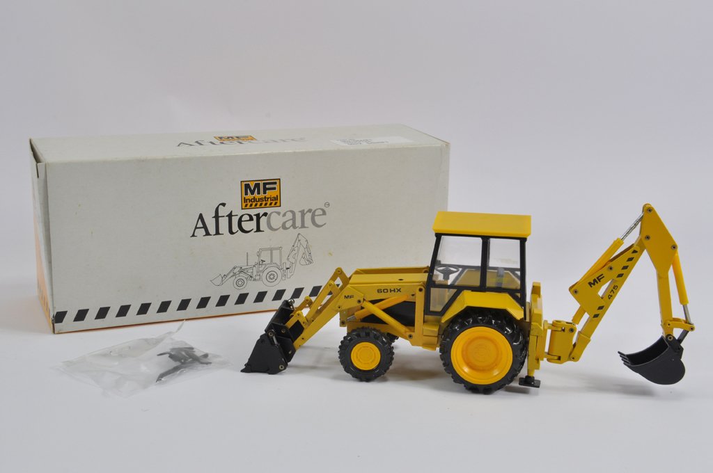 Conrad No. 2953 Massey Ferguson 60HX Backhoe Loader.: Conrad No. 2953 Massey Ferguson 60HX Backhoe Loader. Near Mint in Excellent Box.