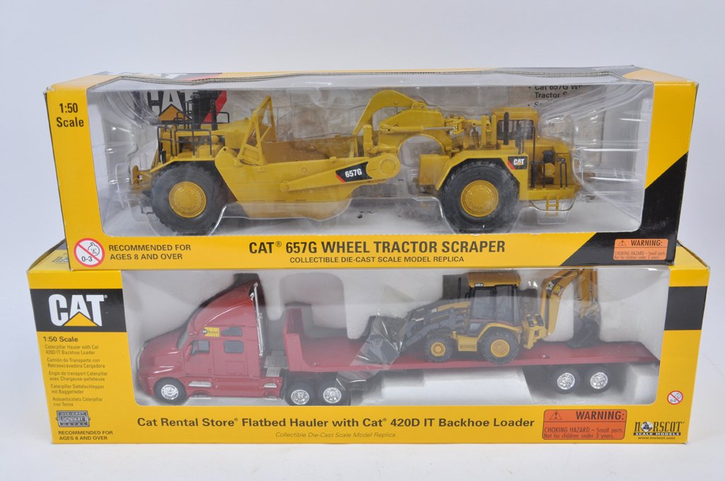 Norscot 1:50 scale CAT 657G Wheel Tractor Scraper plus: Norscot 1:50 scale CAT 657G Wheel Tractor Scraper plus CAT Rental Flatbed Hauler with CAT Backhoe Load. NM-M in E Boxes. (2)