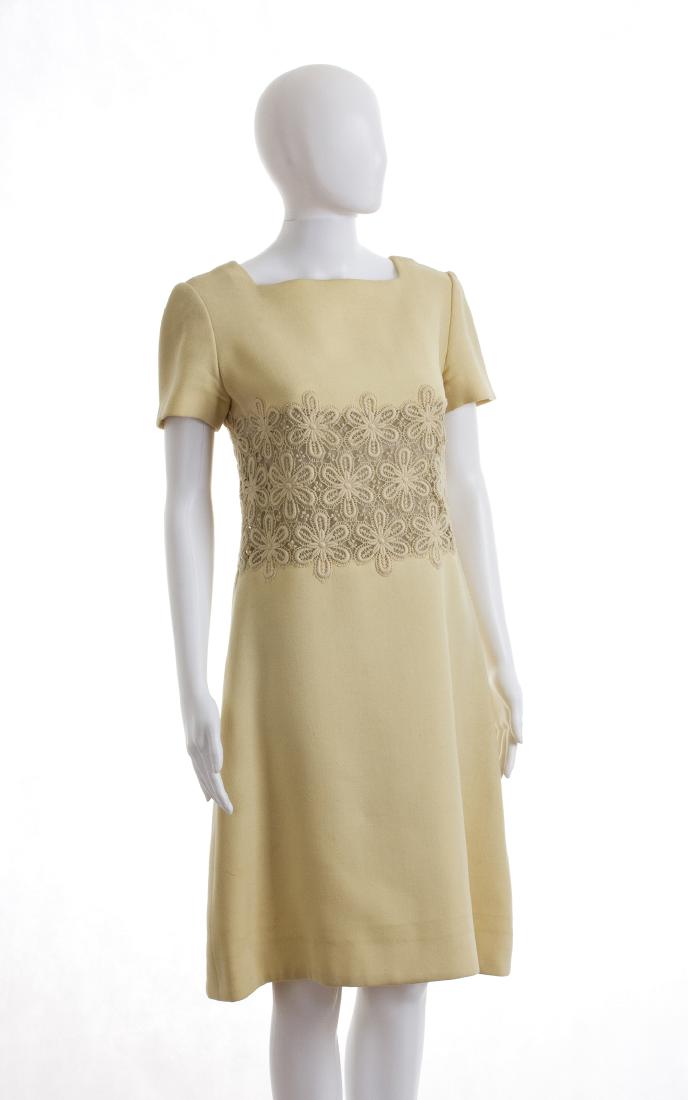 GUY LAROCHE PER MARIE CARINE WOOL CREPE DRESS Early 60s: GUY LAROCHE PER MARIE CARINE WOOL CREPE DRESS Early 60s A butter wool crepe dress with a lace waistband, short sleeves, back zipper Bust 90 cm - waist 76 cm Condition grade B/C GUY LAROCHE PER MARIE C