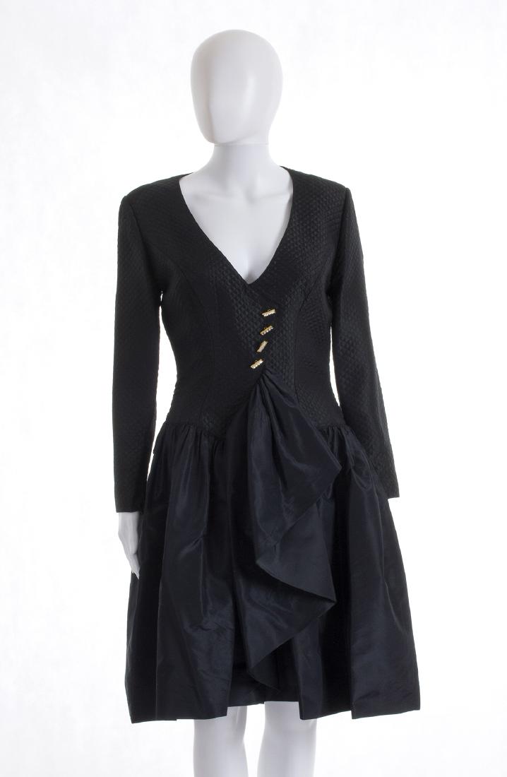 GUY LAROCHE COCKTAIL DRESS Mid 80s: GUY LAROCHE COCKTAIL DRESS Mid 80s A black silk taffetà cocktail dress, quilting bodice, four gilded rhinestone buttons, back zip Bust 90 cm - waist 73 cm Condition grade A GUY LAROCHE, ABITO COCKTAI