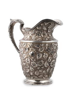 A STERLING SILVER 925‰ WATER PITCHER JUG -: A STERLING SILVER (925‰) WATER PITCHER JUG - BALTIMORE ROSE BY SCHOFIELD, U.S.A. CIRCA 1903-1905 The body of this water pitcher, in the Baltimore Rose pattern is embellished with finely chased rose,