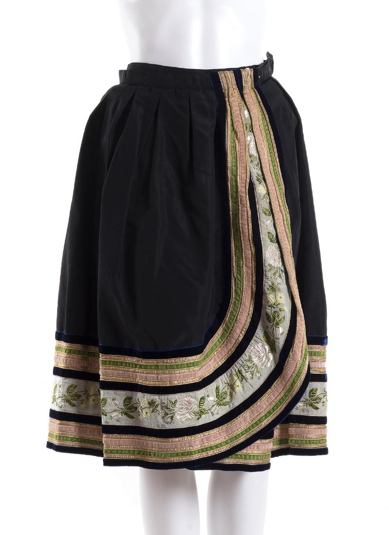 FRANCO BERTOLI, THREE SKIRTS Late 50s -Mid 60s: FRANCO BERTOLI, THREE SKIRTS Late 50s - Mid 60s A lot of three skirts silk/velvet background with trimmings, beads and/or ribbons appliqued. Waist from 65 to 70 cm Condition grade C (some little rips,