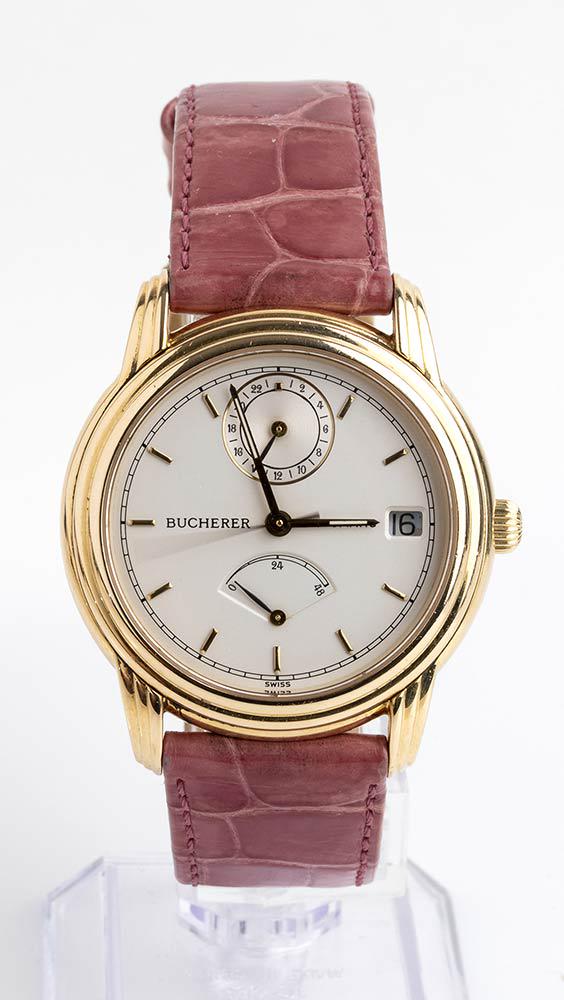 Bucherer gold Watch: Bucherer gold WatchGents Carl F Bucherer Archimedes Dual Timezone in 18K yellow gold Ref#2892-003, c.1995. On lather strap. Stepped case and lug design, case diameter 34.5mm, sapphire display snap-in