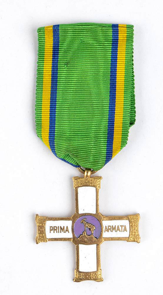 A first Army commemorative cross, Fassino: A first Army commemorative cross, Fassinoenamel, gilt bronzeA first Army commemorative cross, gilt bronze, original ribbon, makerâ€™s marks ( Fassino) on the reverse side.Very fine