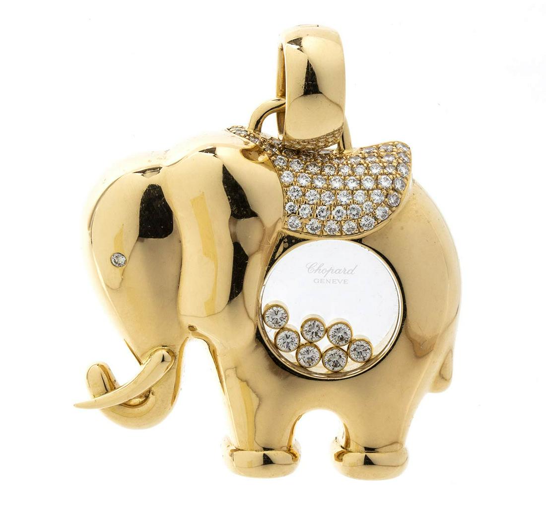 Diamonds pendant - manifacture CHOPARD: 18k yellow gold, from the iconic "Happy Diamonds" range, with floating diamonds inside and a pavÃ© set round brilliant cut diamond for a total of ca. 3.00 ct, F-G, VVS-VS. Signed "CHOPARD". Stamped