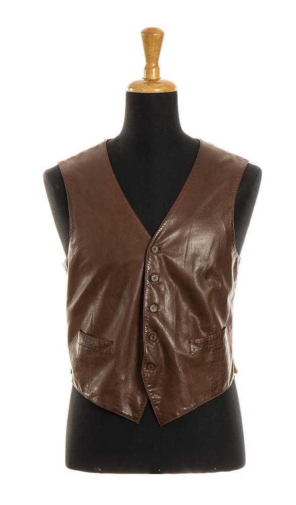 GUCCI LEATHER VEST Late 70s: GUCCI LEATHER VEST Late 70s Light brown wool and leather vest General conditions grading B/C (signs of wear, replaced buttons)