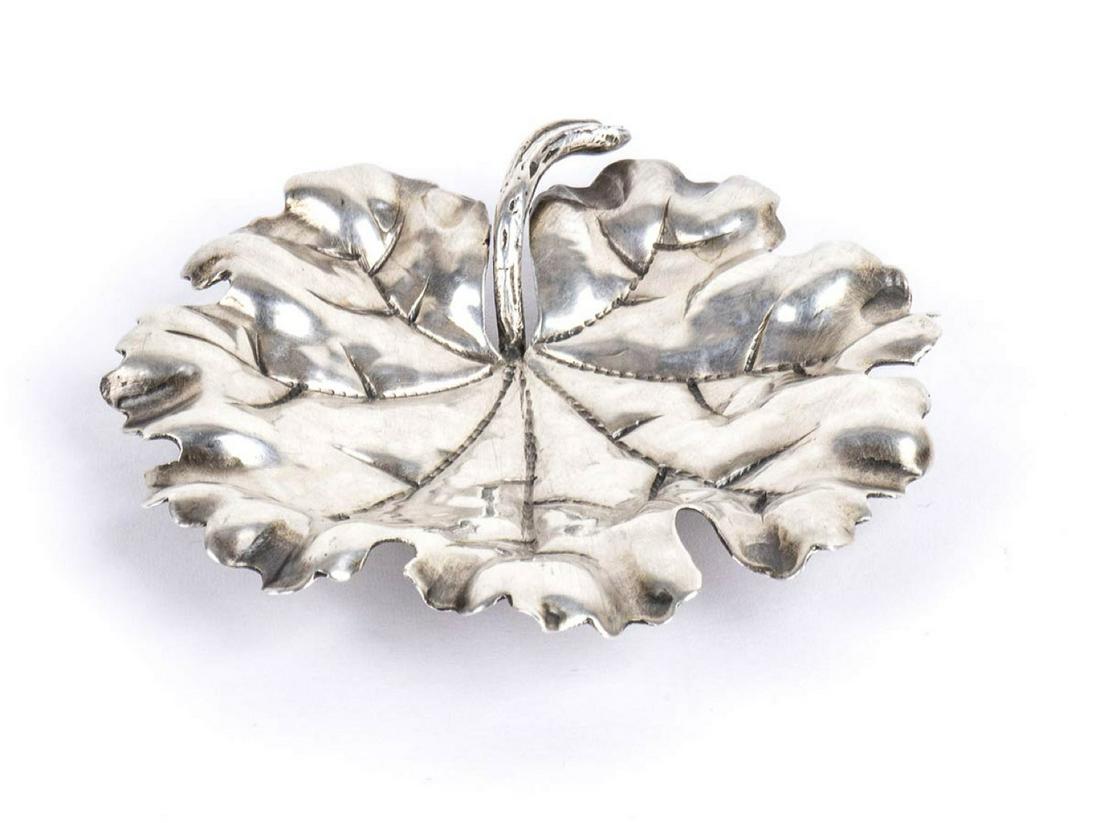 Italian sterling silver leaf, mark of MARIO BUCCELLATI: Italian sterling silver leaf, mark of MARIO BUCCELLATI "Natura" collection, "Vine Leaf" design. Sterling silver, hallmarked "MARIO BUCCELLATI SRL", "925" "ITALY" and " 15 MI". Height x width x depth 1