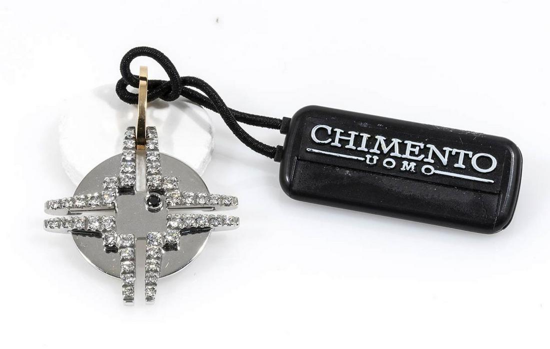 Gold and diamonds pendant, mark of CHIMENTO: Gold and diamonds pendant, mark of CHIMENTO 18 k white and yellow gold, round shaped pendant set with diamonds forming a cross design ca. 0.35 ct G, VVS; black diamond ca. 0.02 ct. Manufacture CHIMENT