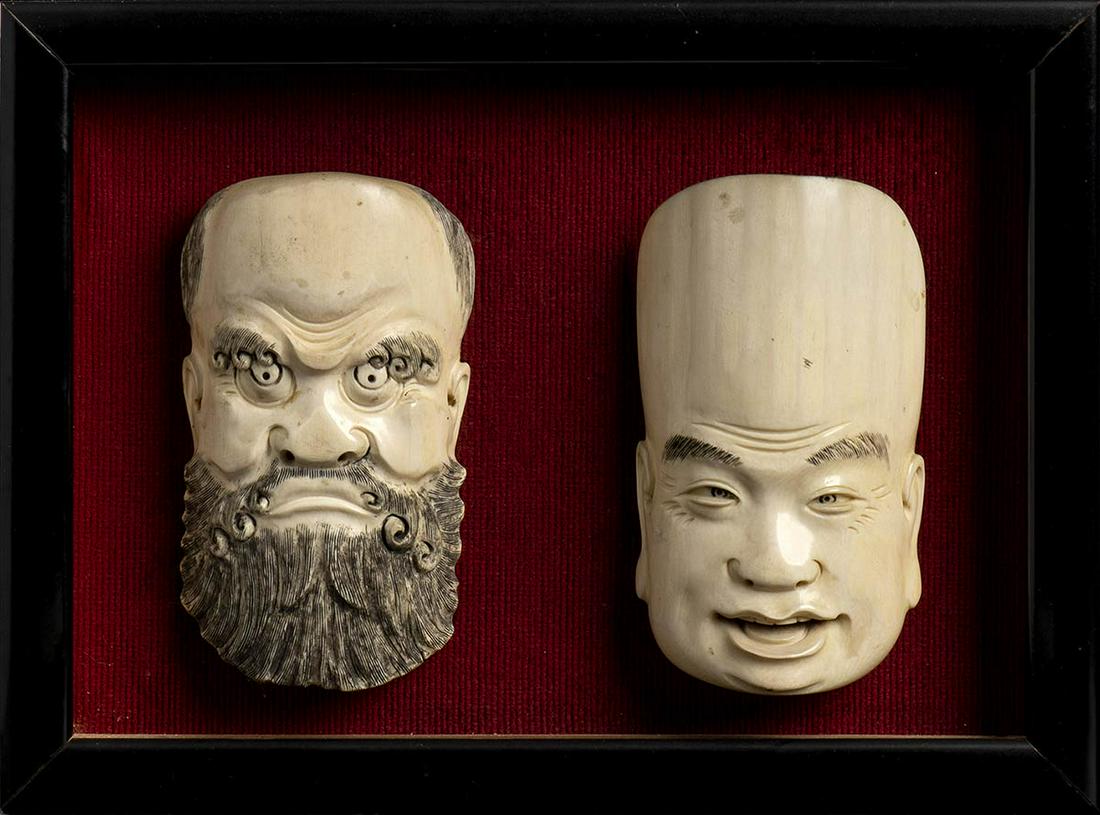 TWO IVORY MASKS China, early 20th century (1 of 4)