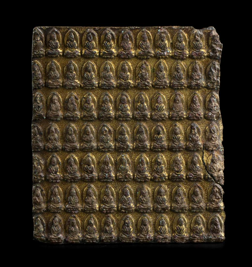 A GILT BRONZE PLAQUE WITH A MULTITUDE OF BUDDHA China, Liao dynasty (1 of 2)