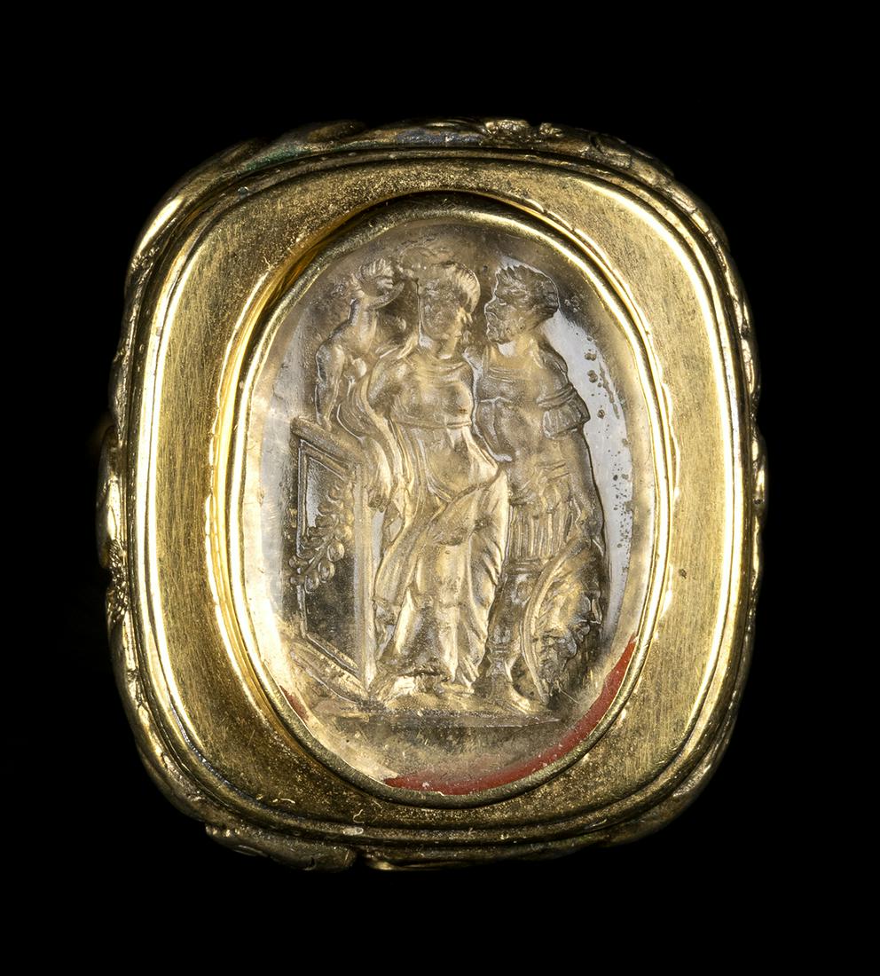 A GLASS IMPRESSION SET IN A GILDED FOB SEAL. VENUS AND MARS.: A GLASS IMPRESSION SET IN A GILDED FOB SEAL. VENUS AND MARS.18th-19th centuryGlass 14x19 mm; H 21 mm; 8,64 grGrand Tour Era glass impression after a prase intaglio in the collection of the King of Fra