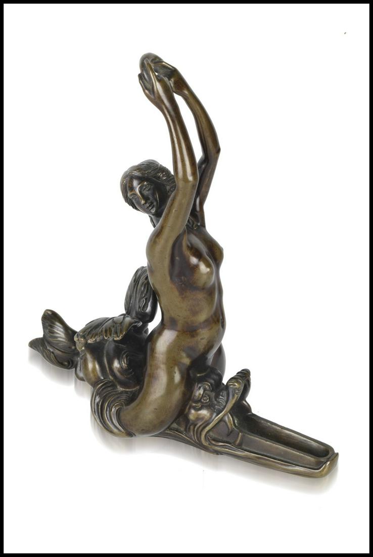 Barthelemy Prieur (Berzieux, 1536 -Parigi, 1611) (workshop of) Nereid riding on a Dolphin: Barthelemy Prieur (Berzieux, 1536 -Parigi, 1611) (workshop of) Nereid riding on a Dolphin17th century Bronze, gold-redish patina with traces of dark brown patina 17x15x6 cmFine oil lamp with a Nereid