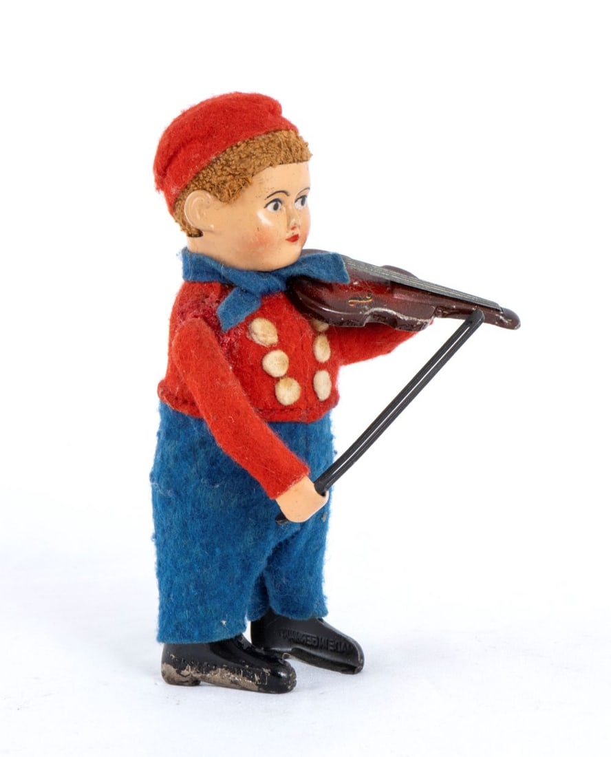 Violin player character: Character from SCHUCO, Germany, character in costume (Bavarian ? Hungarian ?) violin player, wind up mechanism. 1930s. Marked on the feetIn perfect condition, working. Height approximately 13 cm