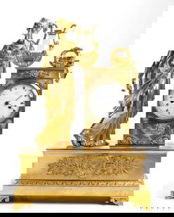 French Empire bronze mantel clock: Height x width x depth : 55 x 40 x 16 cmMercury-gilded bronze case resting on four leafed feet, richly decorated at the top with a female figure with harp. Clock with circular white enamel dial with t