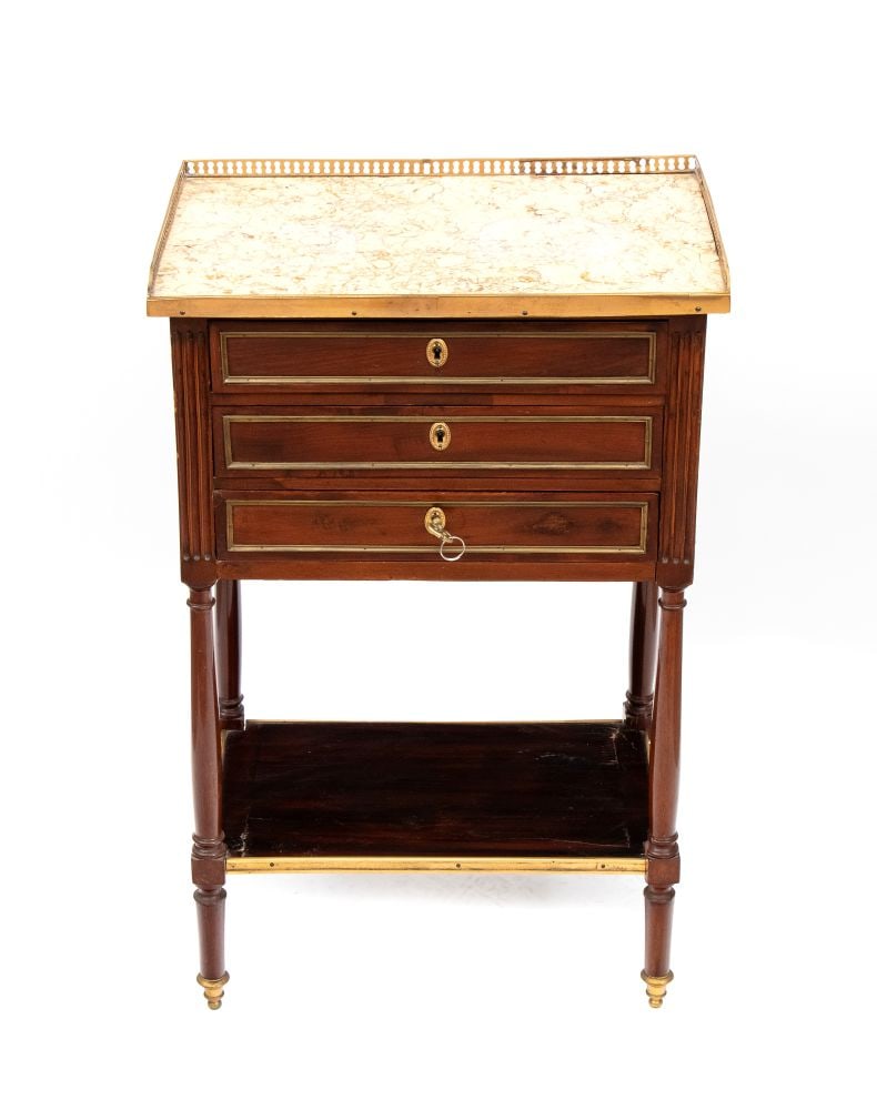 Louis XVI-style nightstand - France, 19th century: Louis XVI-style nightstand - France, 19th centuryHeight x width x depth: 78 x 50 x 33 cmNapoleonic era, this piece is crafted from mahogany with a white marble top adorned with an openwork bronze fram