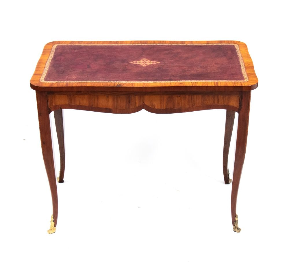 Louis XV purple ebony writing desk - France, circa 1740-1750: Louis XV purple ebony writing desk - France, circa 1740-1750Height x width x depth: 66 x 83 x 47 cmof rectangular shaped form resting on curved legs with gilded bronze feet, writing tabletop with draw