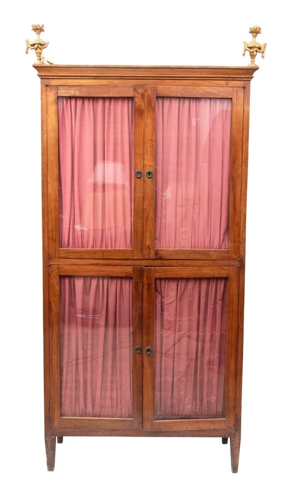 Cherry Wood Bookcase Display Cabinet - Central Italy, 18th-19th centuries: Cherry Wood Bookcase Display Cabinet - Central Italy, 18th-19th centuriesHeight x width x depth: 222 x 114 x 40 cman elegant display cabinet with four glass doors; the top is adorned with a pair of gi