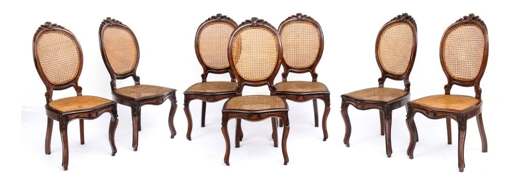 Set of seven Italian straw chairs - Italy, 19th century: Set of seven Italian straw chairs - Italy, 19th centuryHeight x width x depth: 105 x 49 x 49 cm. Seat height: 45 cm.Louis Philippe period, walnut with rosewood inlay, hand-woven straw backrest and sea