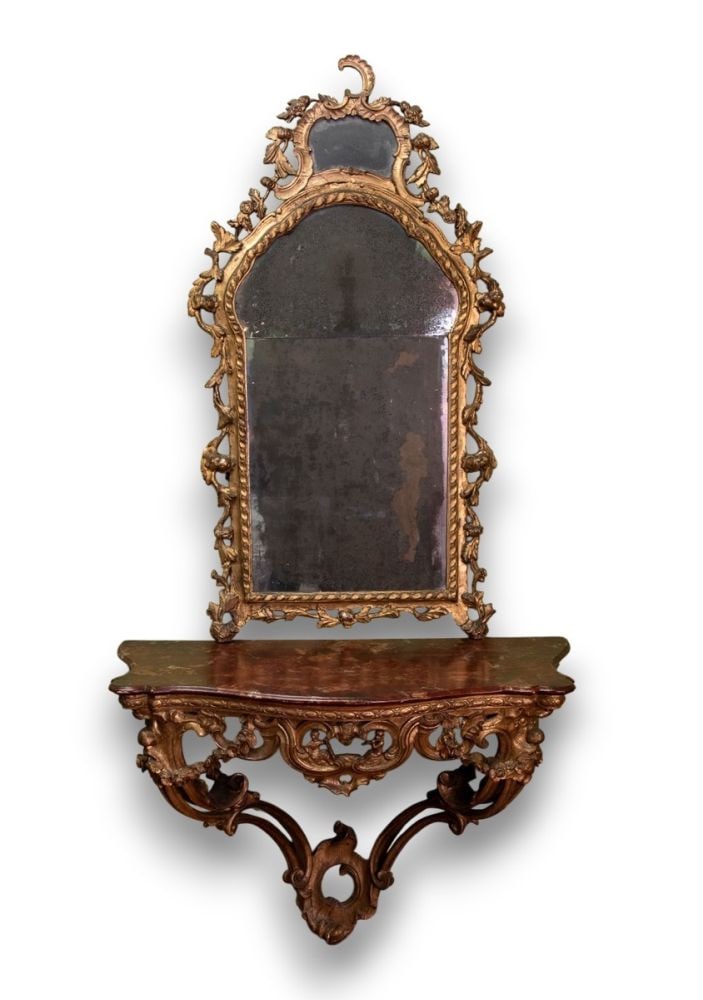 Mirror with carved and gilded wooden console - Venice, mid 19th century: Mirror with carved and gilded wooden console - Venice, mid 19th centuryConsole height x width x depth: 82,5 x 119 x 58 cm. Mirror height x width x depth: 150 x 83 x 8 cm.in Venetian Rococo style, the