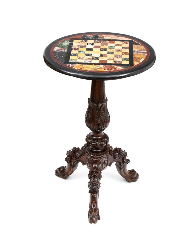 Grand Tour table - Rome, 1850: Grand Tour table - Rome, 1850Height x diameter: 84 x 54 cmcircular and made of marquetry and carved walnut. The tabletop features a central checkerboard pattern in polychrome marbles. The outer border