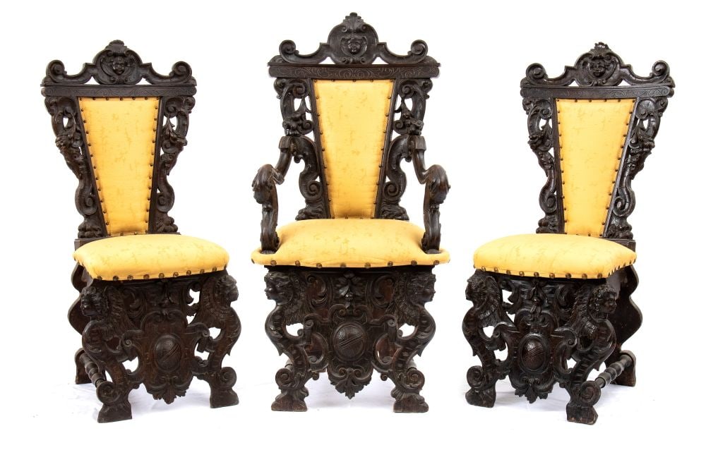 Headpiece and pair of carved Italian chairs, Renaissance - 16th century: Headpiece and pair of carved Italian chairs, Renaissance - 16th centuryFlorentine area, carved walnut, winged female figures in profile on base on feral paws, family crest in centre, backs carved with