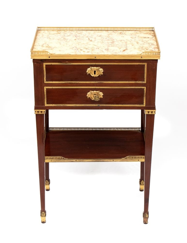 Louis XVI-style nightstand with a marble top and gilded bronze hardware - France, 19th century: Louis XVI-style nightstand with a marble top and gilded bronze hardware - France, 19th centuryHeight x width x depth: 79 x 51 x 34 cmCrafted from mahogany, with a white marble top set within a perfora