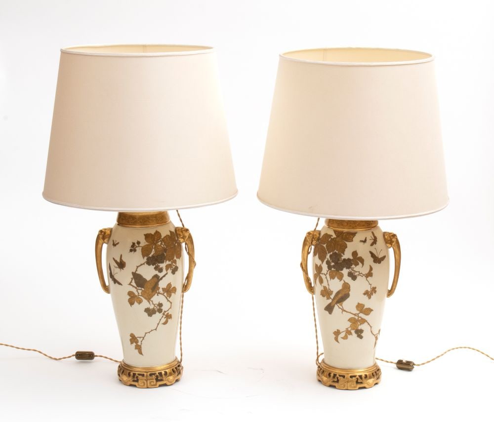 Janetti Padre & Figli () Pair of oriental-style table lamps - Late 19th century: Janetti Padre & Figli() Pair of oriental-style table lamps - Late 19th centuryHeight x diameter: 80 x 45 cmoval-shaped, made of ivory-colored ceramic, decorated with naturalistic motifs depicting bird