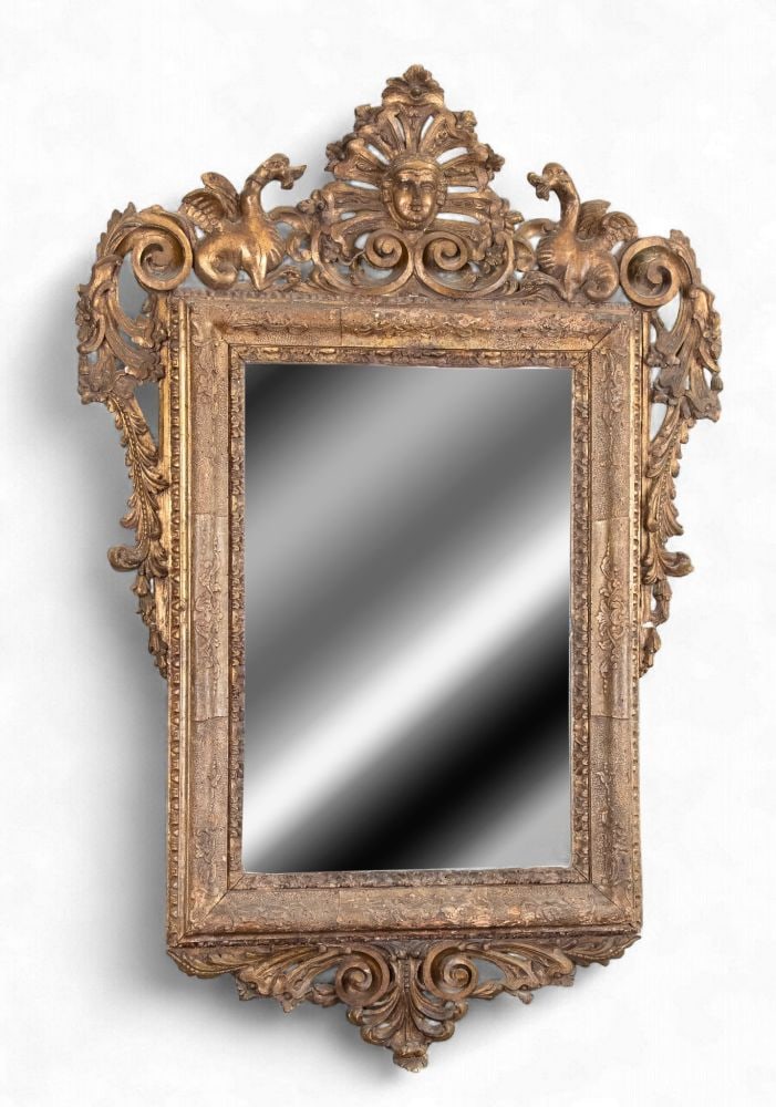 Italian gilded Louis XV mirror - 18th century: Italian gilded Louis XV mirror - 18th centuryHeight x width x depth: 160 x 110 x 10 cm.rectangular in shape with a finely carved and gilded wooden frame, characterised by rich Baroque decoration with