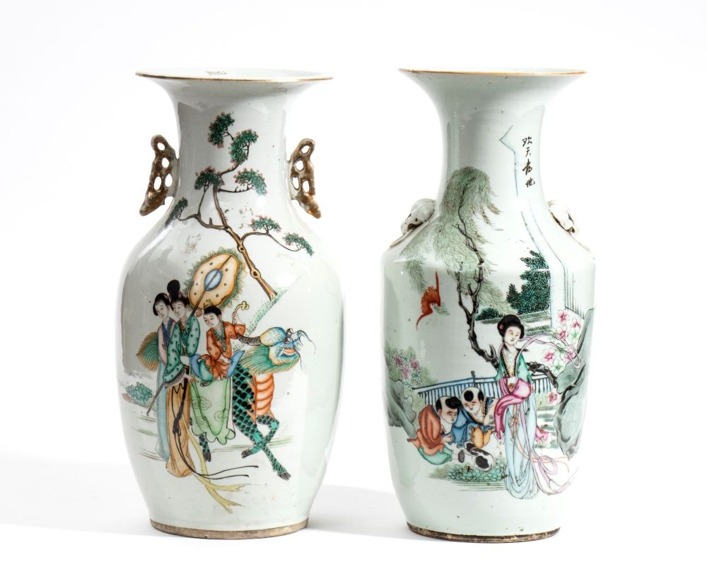 A pair of Porcelain Vases - 19th century: A pair of Porcelain Vases - 19th centuryHeight x diameter: 43 x 21 cm.Porcelain finely painted in polychrome enamels of the Famille Rose (fencai) palette and inscribed with black calligraphic characte